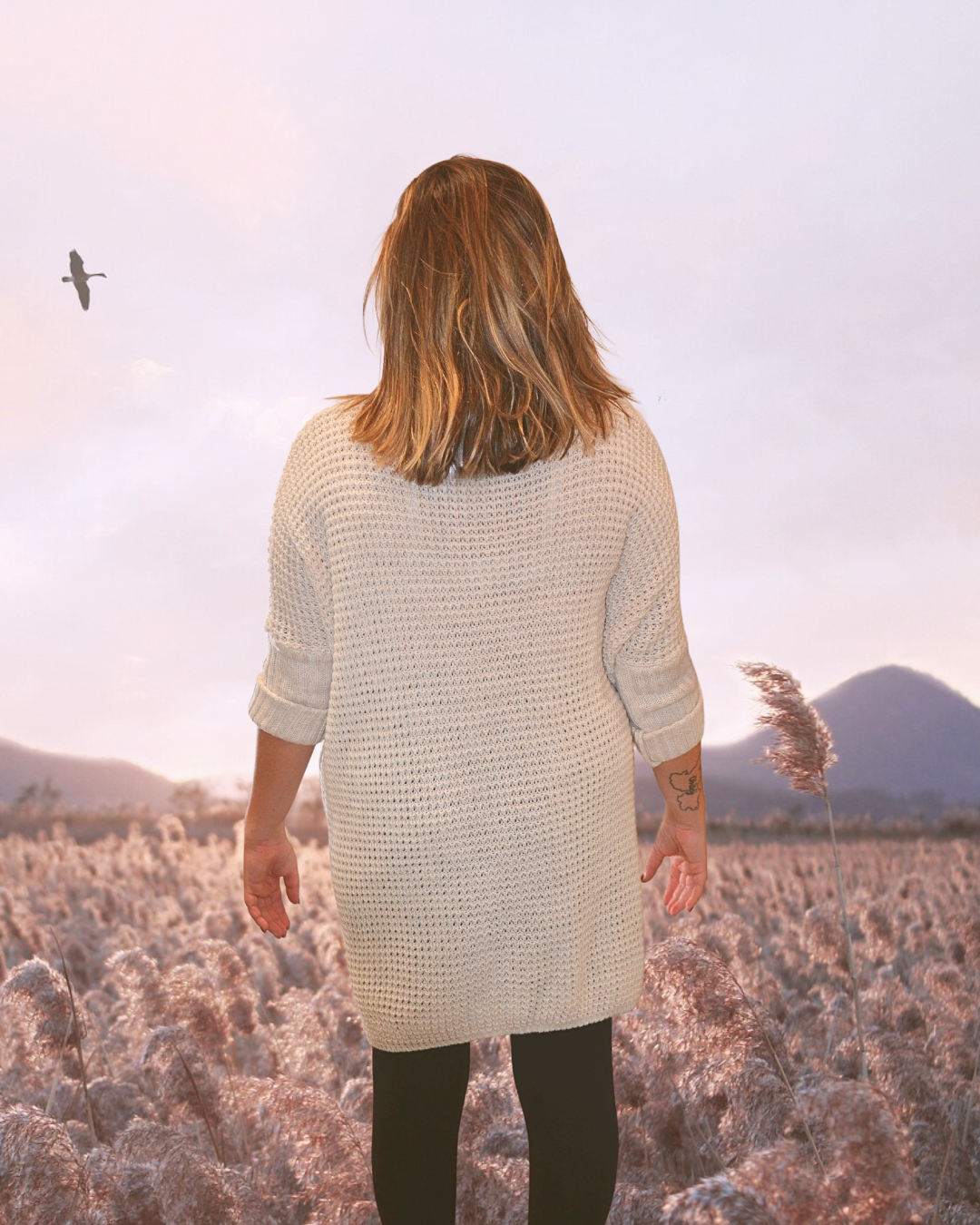 Mannequin de dos portant le pull Marguerite ecru