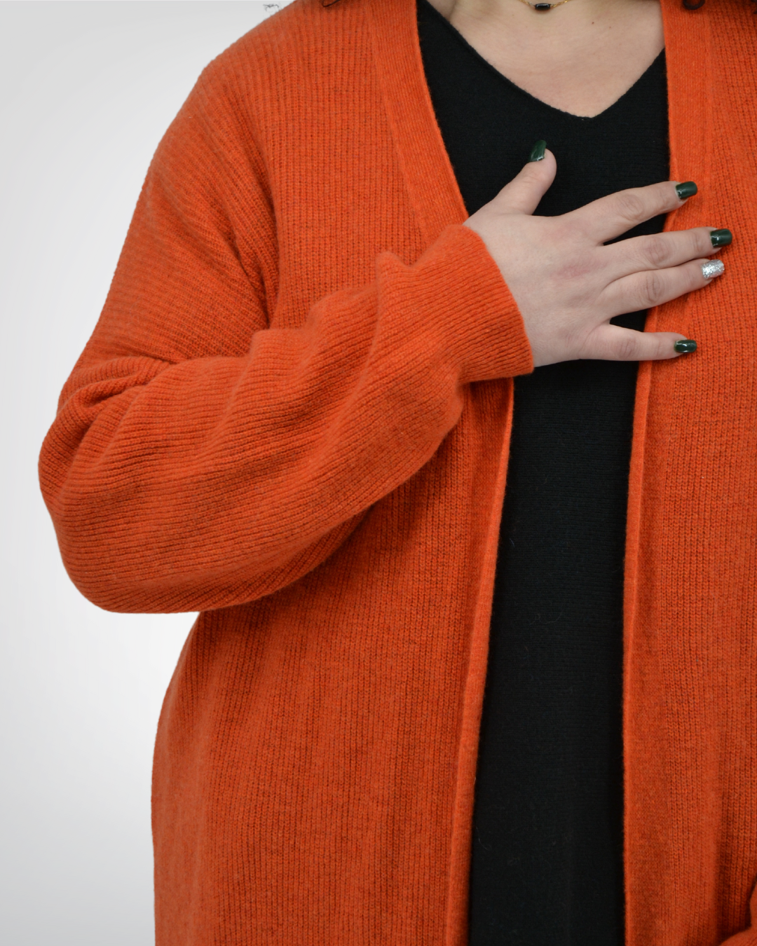 Zoom sur les détails du gilet Berenice tangerine