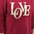 Zoom sur l'inscription Love du pull jonas bordeaux